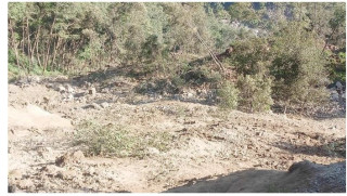 वर्षापछि आएको बाढी र पहिरोले बझाङको बुंगलमा घर, घट्ट र कुलो बगायो